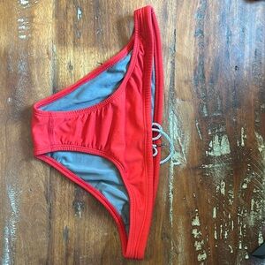 Jolyn. Red size large midl swim bottoms.